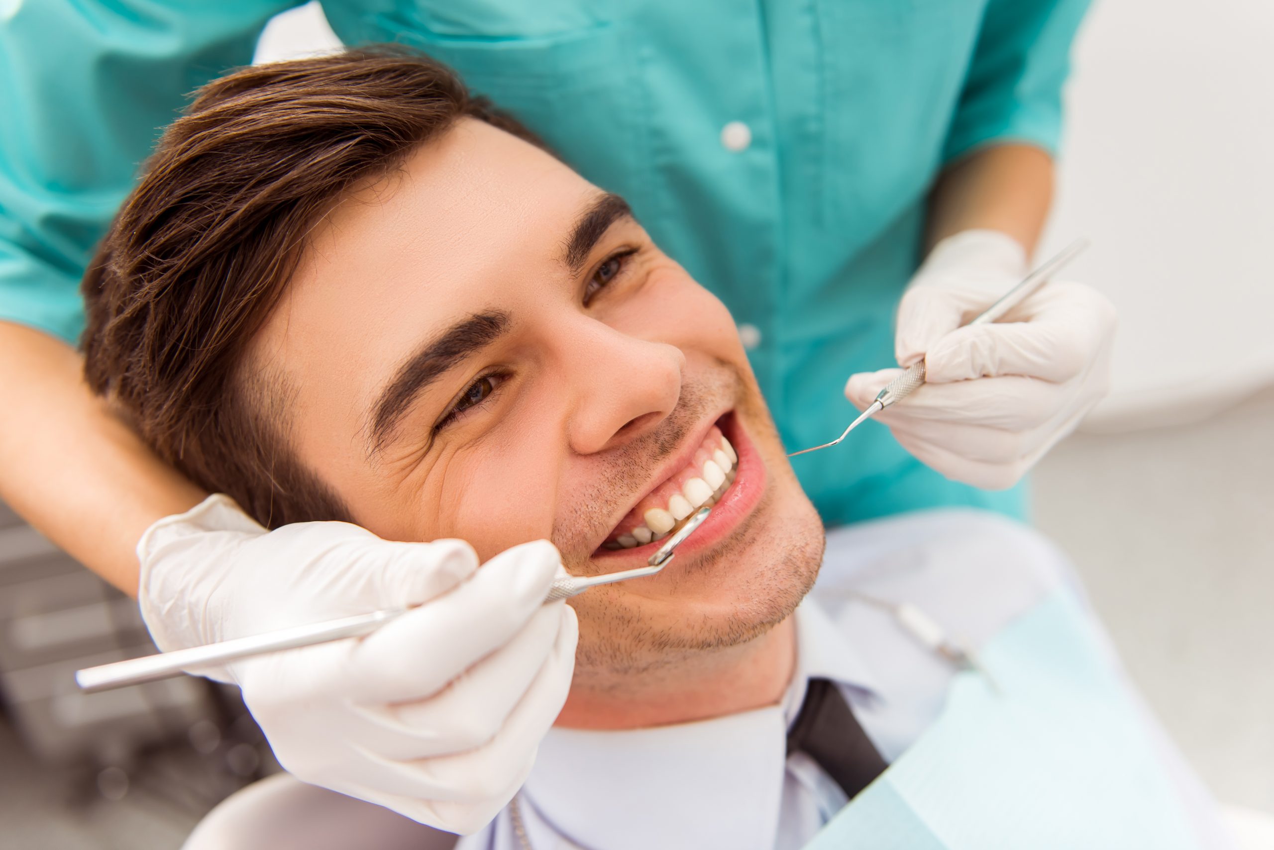 High Park dentist checking a patient