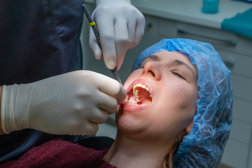 Woman during tooth extraction